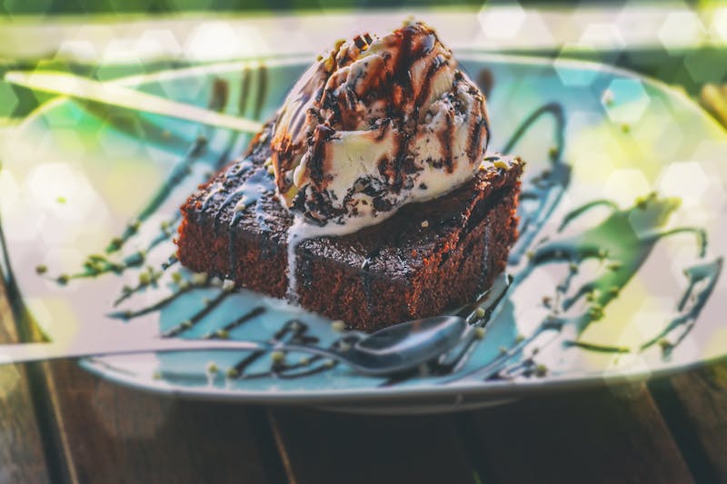 Chocolate Lava Brownie warm dessert with vanilla drizzle